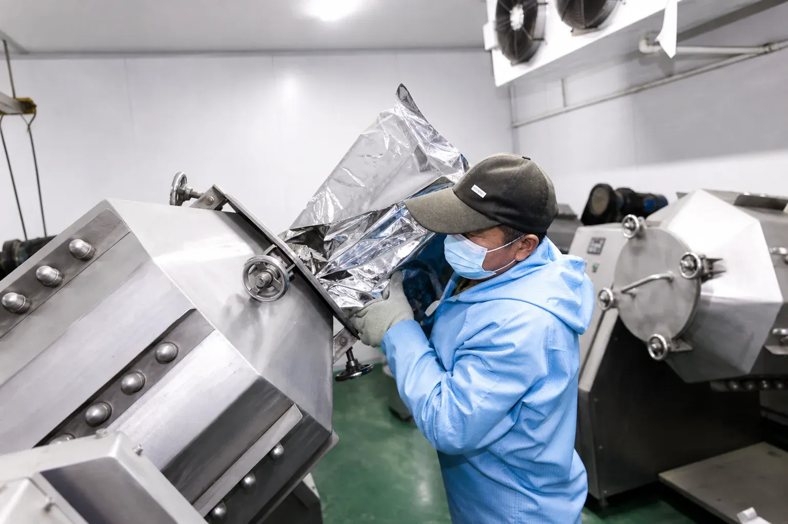 Operator loading ball-milling equipment